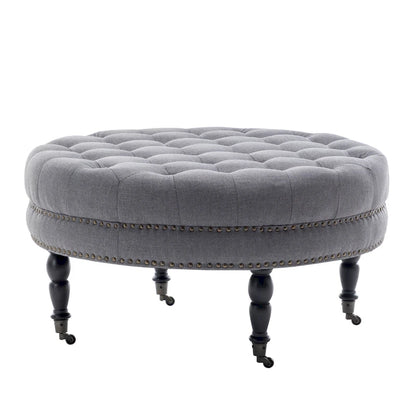 Porthos Home Indy Fabric Round Cocktail Ottoman with Rubberwood Legs and Wheels